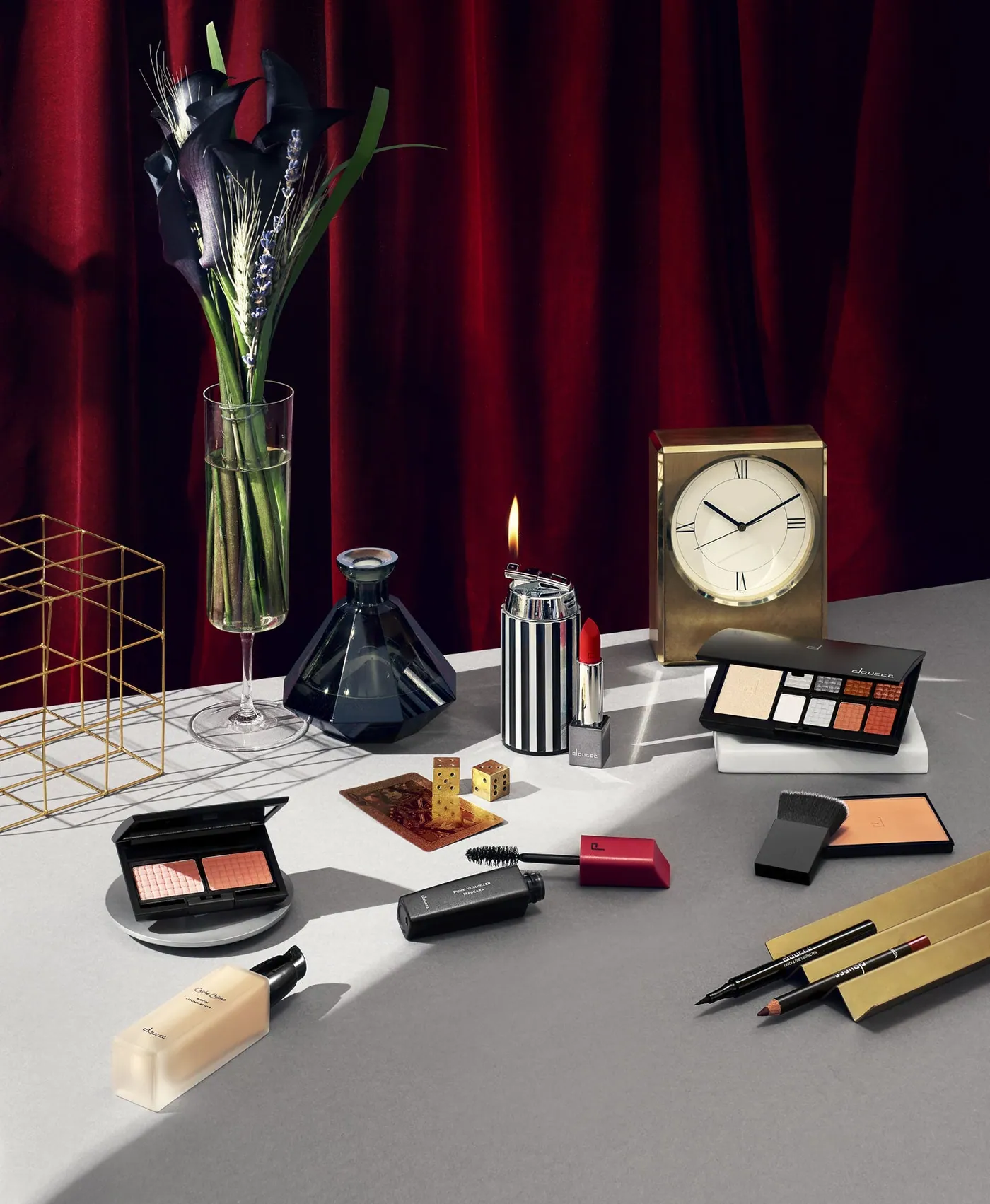 Doucce products laid out from a makeup bag